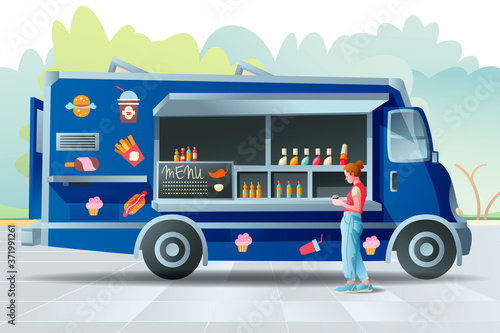 Food track.   A young woman buys coffee..