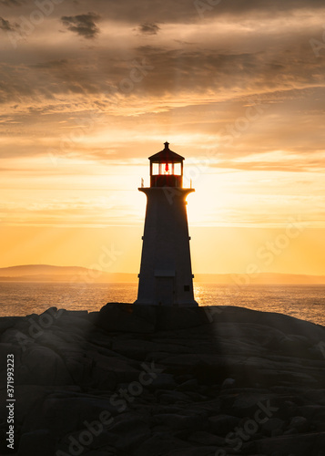 Peggy's Cove lighthouse at sunset, Nova Scotia