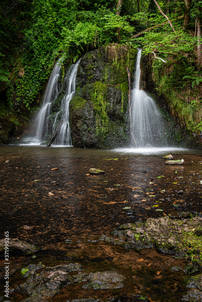 Top Falls at Fairy Glen Nature Reserve. A popular woodland walk with two delightful waterfalls, close to the village of Rosemarkie, in the Scottish Highlands Top Falls at Fairy Glen Nature Reserve. A popular woodland walk with two delightful waterfalls, close to the village of Rosemarkie, in the Scottish Highlands
