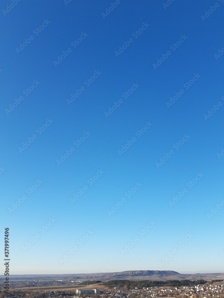 Panoramic mountain view. Rocky desert and blue sky. soft focus Panoramic mountain view. Rocky desert and blue sky. soft focus