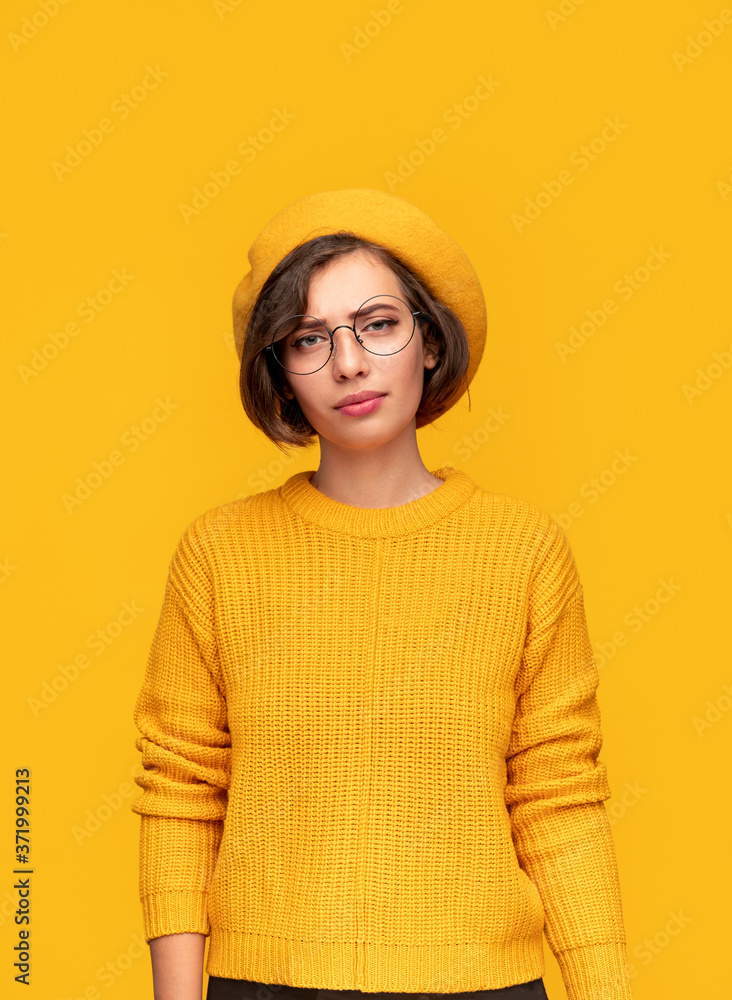 Sceptical woman looking at camera