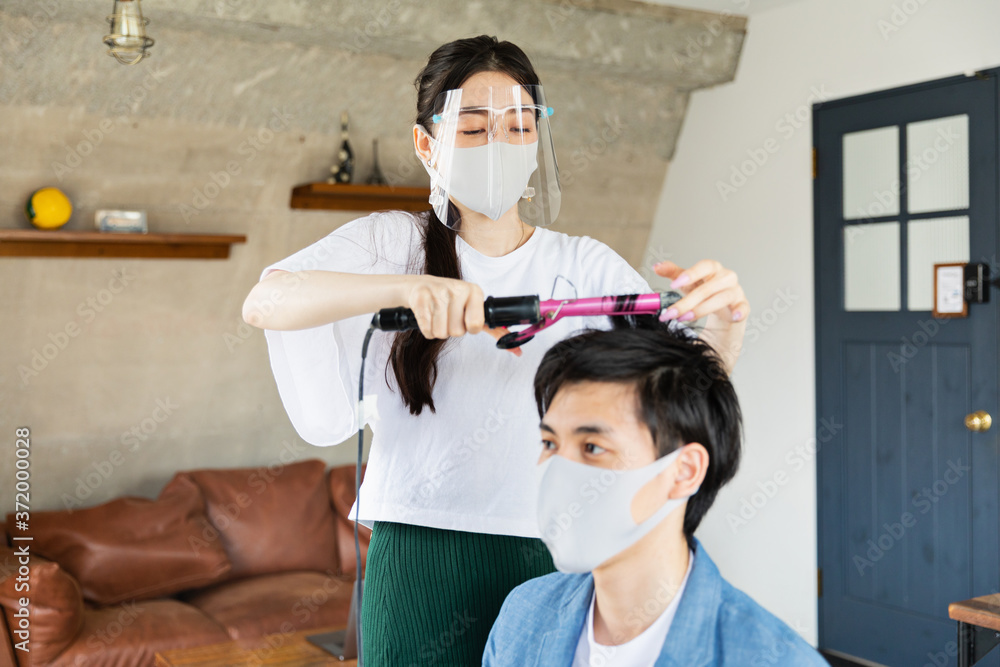 Hairdresser and Customer Wearing Protective Masks Hairdresser and Customer Wearing Protective Masks