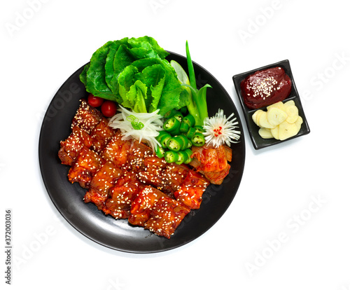 Spicy Grilled Pork Belly with Kochujang Sauce (Dwaeji Bulgogi) is popular Spicy Korean BBQ photo