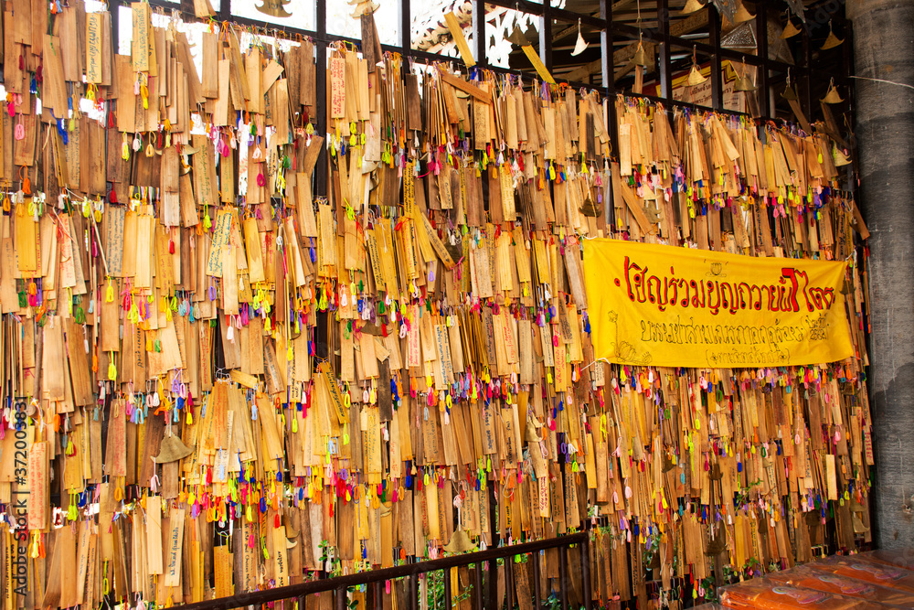 Travelers thai people travel visit and respect Su Tong Pae golden buddha and writing on bamboo plate blessing for praying of Phu Sa Ma temple at Pai city on February 28, 2020 at Mae Hong Son, Thailand