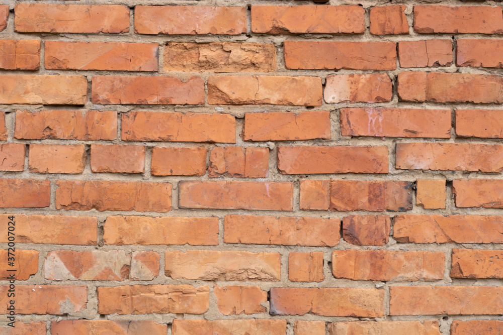 Obraz premium Wall of red bricks. Texture or background of bricks.