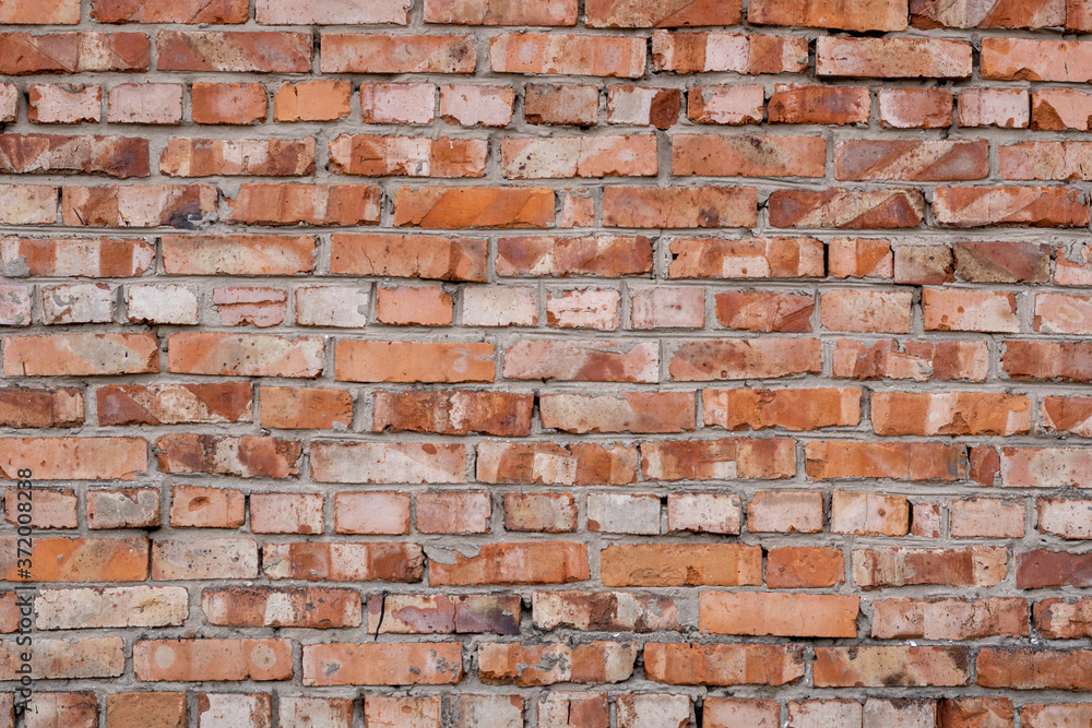 Wall of red bricks. Texture or background of bricks. Wall of red bricks. Texture or background of bricks.