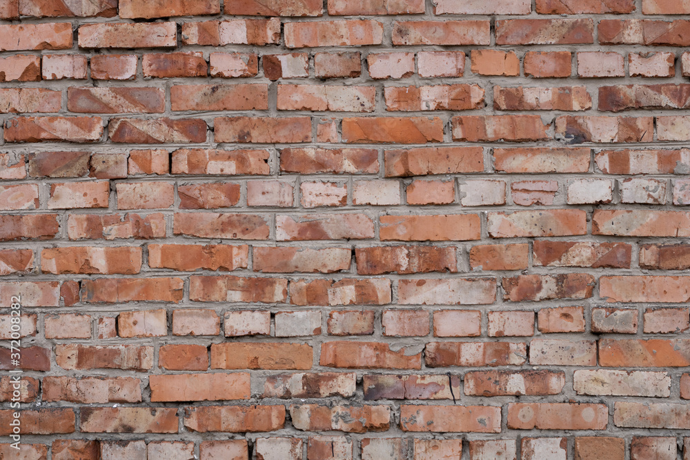 Wall of red bricks. Texture or background of bricks. Wall of red bricks. Texture or background of bricks.