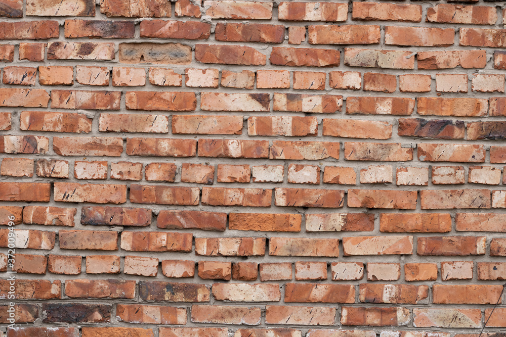 Wall of red bricks. Texture or background of bricks. Wall of red bricks. Texture or background of bricks.