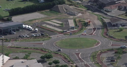Newly constructed infrastructure, overlooking a roundabout, not much traffic
