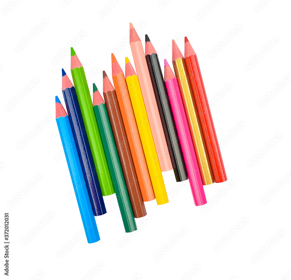 Stack of different colored wood pencil crayons scattered across a white background Stack of different colored wood pencil crayons scattered across a white background