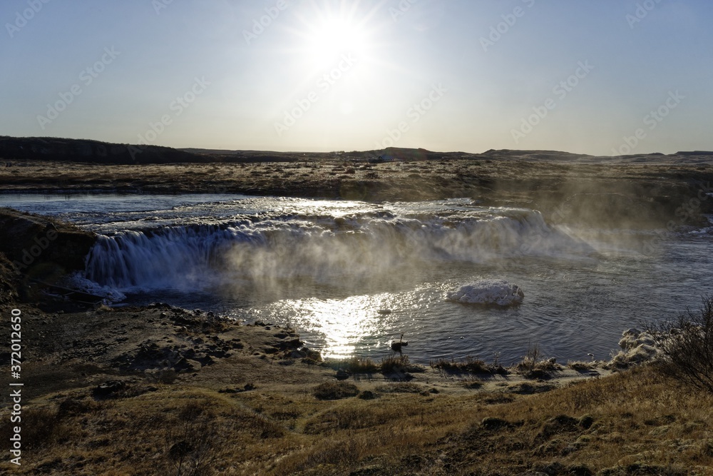 sunrise over the waterfall