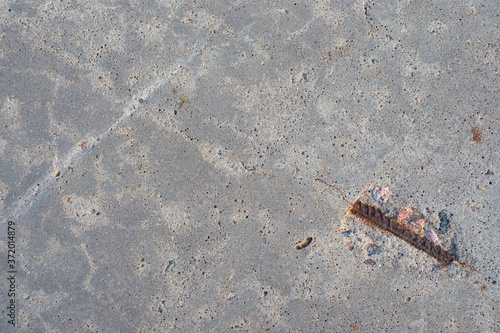 Concrete slab with metal fi...