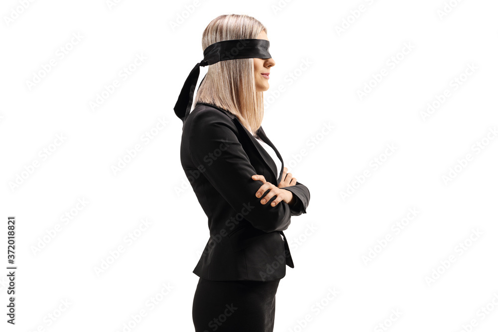 Profile shot of a businesswoman wearing a blindfold Profile shot of a businesswoman wearing a blindfold