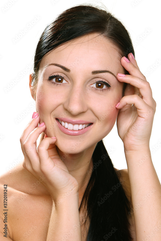 Beautiful face of young smiling woman with clean fresh skin Beautiful face of young smiling woman with clean fresh skin