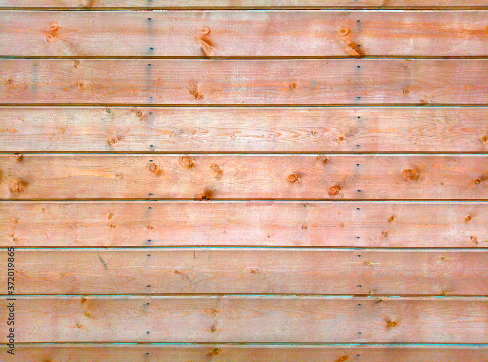 Naklejka premium Background from wooden boards for design wooden texture orange