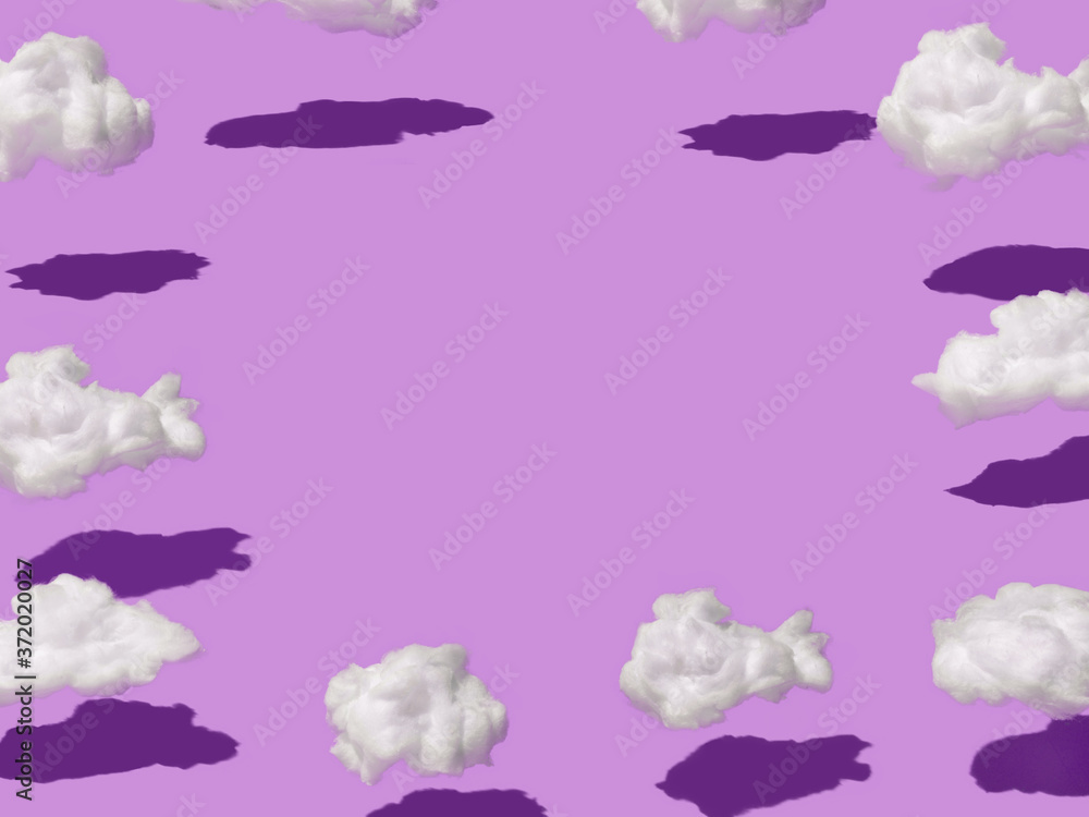 Pattern made of clouds of cotton wool on pastel pink background. Cyberpunk aesthetic concept art. Minimal surrealism. Pattern made of clouds of cotton wool on pastel pink background. Cyberpunk aesthetic concept art. Minimal surrealism.