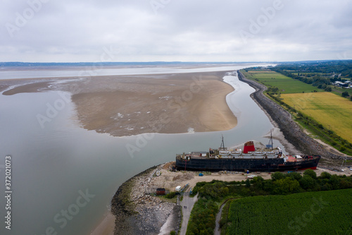 Mostyn Docks, River Dee, North Wales, UK. TSS Duke of Lancaster abandoned railway steamer ship docked in Mostyn Docks, River Dee, North Wales photo