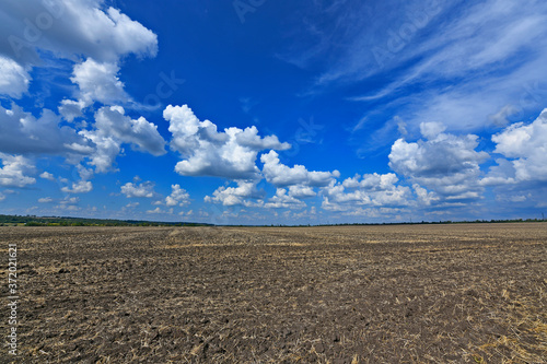 A plowed field after harvest. Rural landscapes Ukraine Maryanovka village. photo