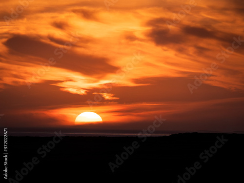 Sunset with red and orange sky © Karakedi