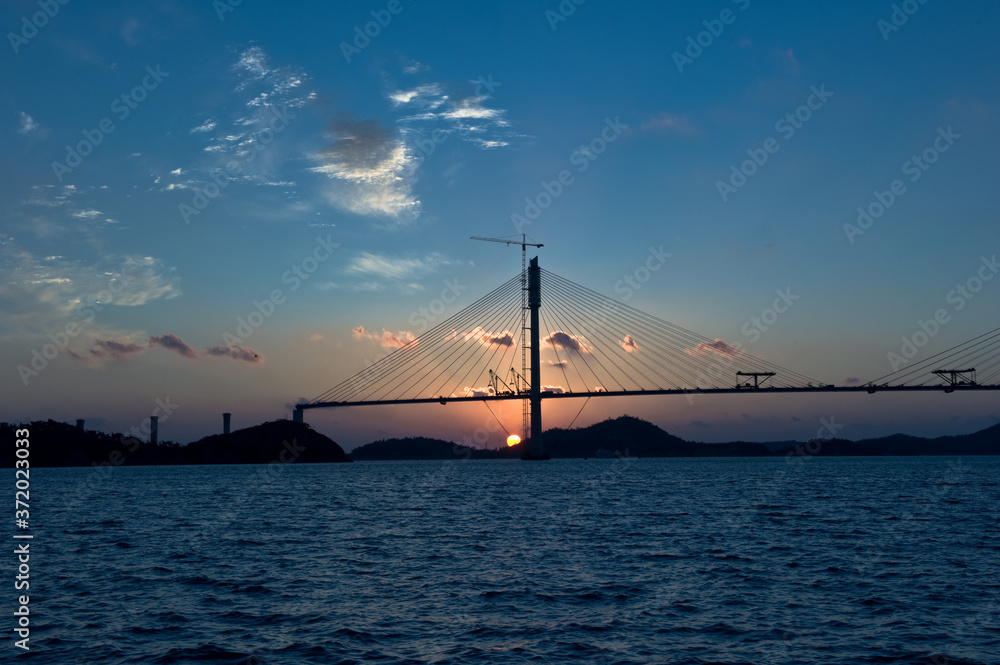 Wonderful sunset night view of the grand bridge background blue sky and clouds