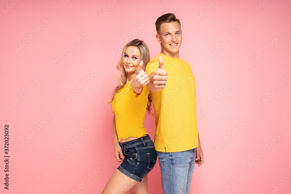 Beautiful young couple smiling.