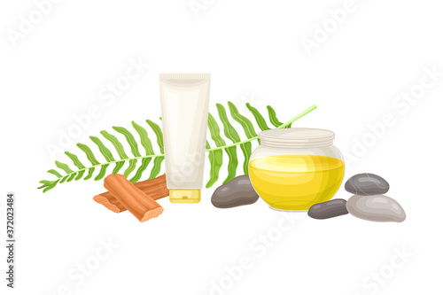 Spa Treatment with Stones, Sandal Wood and Skin Lotion Tube Vector Composition