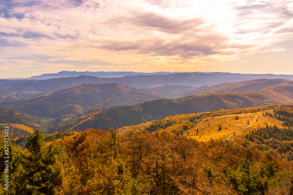 Panorama of autumn mountains and sky at sunset Panorama of autumn mountains and sky at sunset
