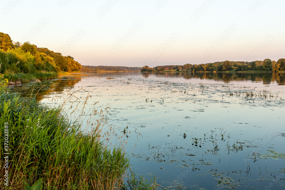 View to the river Daugava at sunset hour in August In Skriveri in Latvia