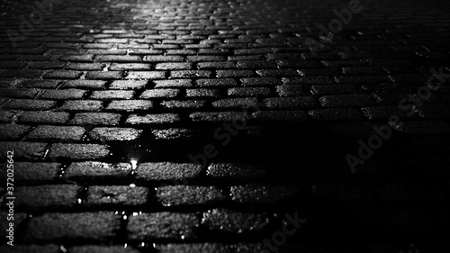 Stone road after rain.
