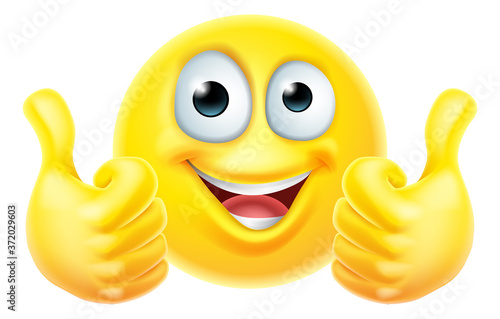 An emoji or emoticon cartoon icon face giving double thumbs up photo