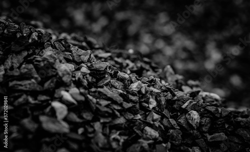 Coal Mine. Natural black coals for background. Industrial coals. Volcanic rock energy on earth. Stone Natural Energy Source.