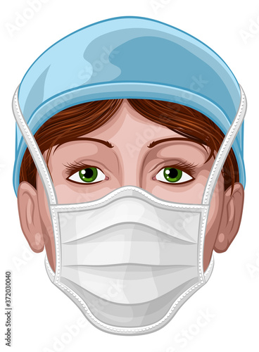 A doctor or nurse female woman face wearing protective face mask PPE personal protection equipment