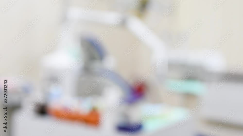 Authentic dentist office blurred background. Dental doctor cabinet. Out of focus shot. Authentic dentist office blurred background. Dental doctor cabinet. Out of focus shot.