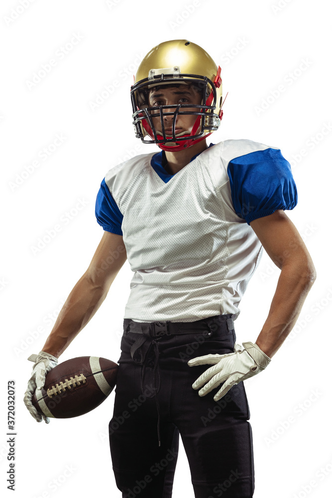 Confident posing. American football player isolated on white studio background with copyspace. Professional sportsman during game playing in action and motion. Concept of sport, movement, achievements