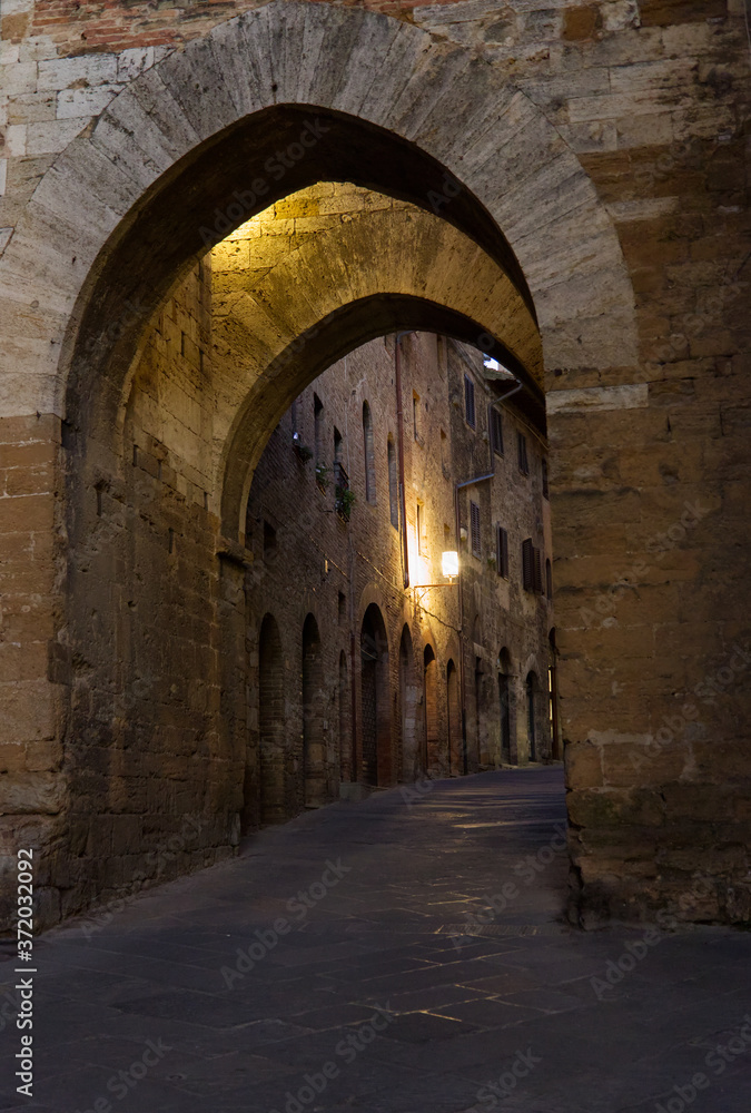 Alley at night in the town of San Gimignano in Tuscany