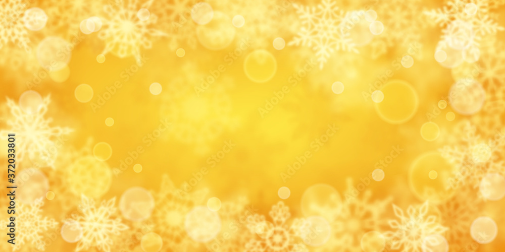 Christmas background of blurry snowflakes in yellow colors Christmas background of blurry snowflakes in yellow colors