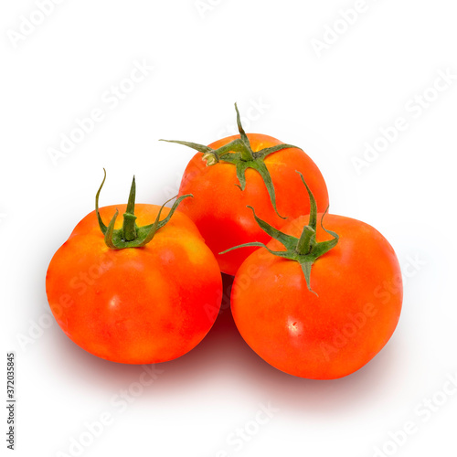 3 tomatoes isolated on white background