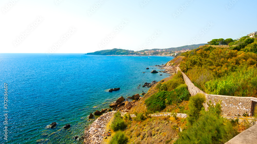 Mediterranean sea shore in Piombino, Tuscany, Italy. Tourism destination, summertime vacation