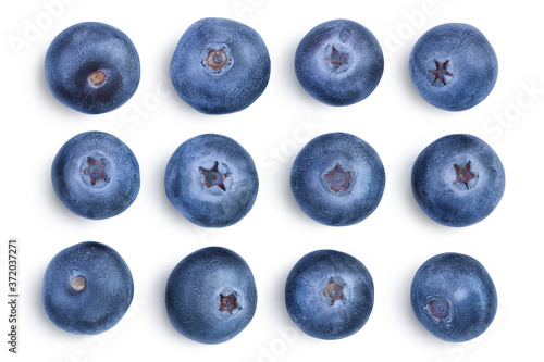fresh ripe blueberry with leaves isolated on white background with clipping path . Top view. Flat lay pattern. Set or collection