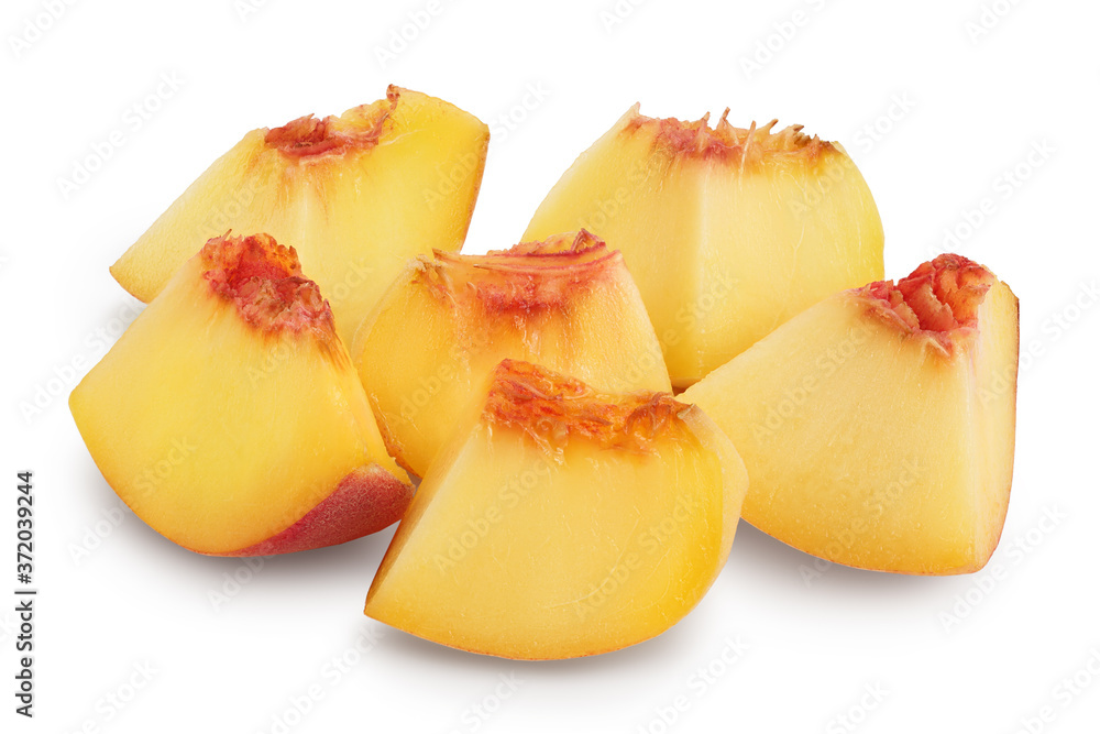 Ripe peach fruit slices isolated on white background with clipping path and full depth of field Ripe peach fruit slices isolated on white background with clipping path and full depth of field