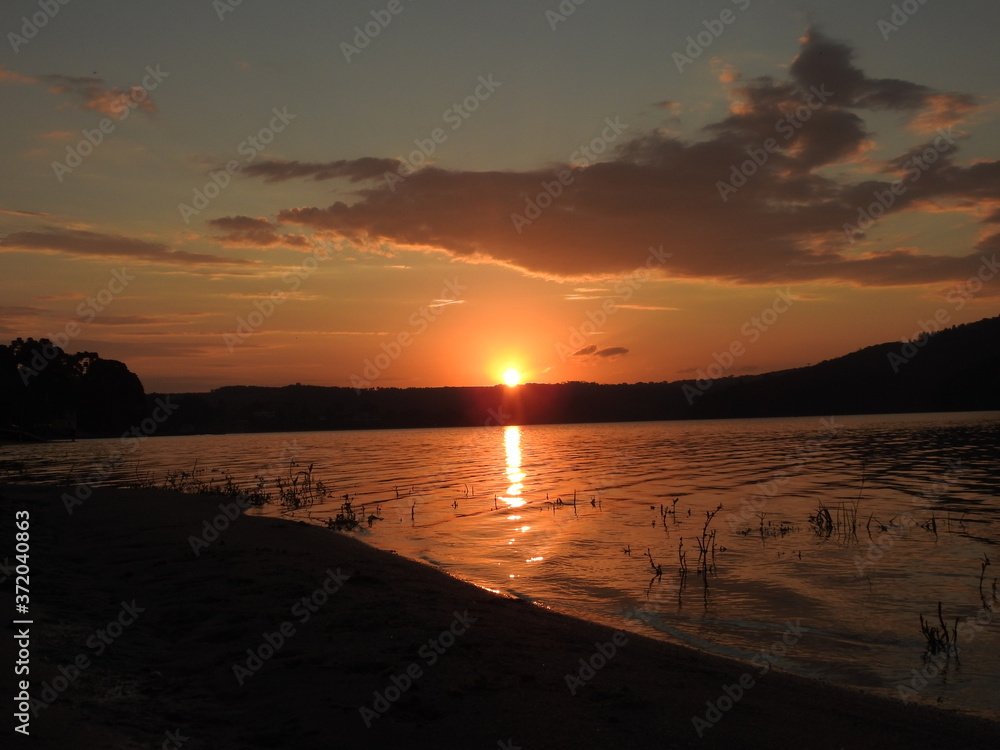 sun set in the lake