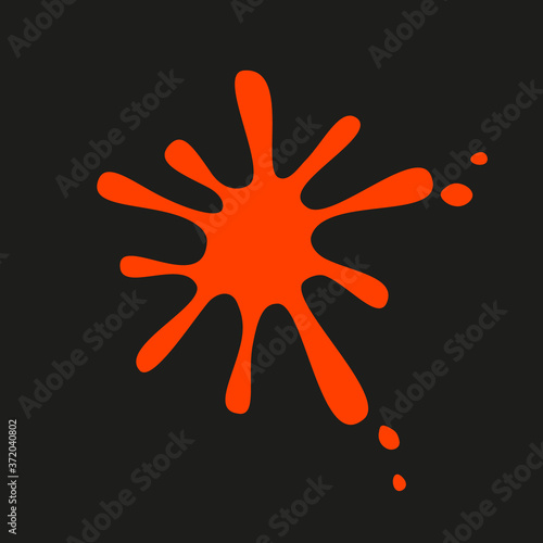Bright orange blot with drops on a black background. Isolated.