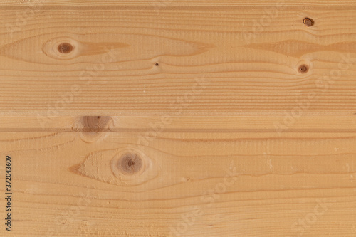 Pine boards. The texture of wooden boards. Pine boards texture. Wooden surface. Pine boards with knots. photo