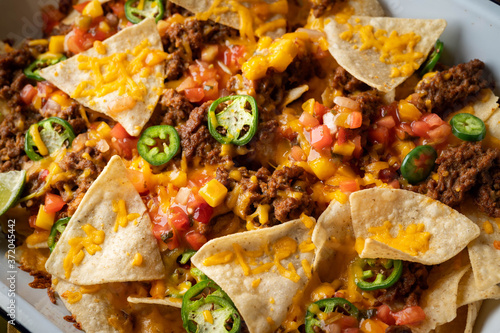 nachos in white iron pan photo