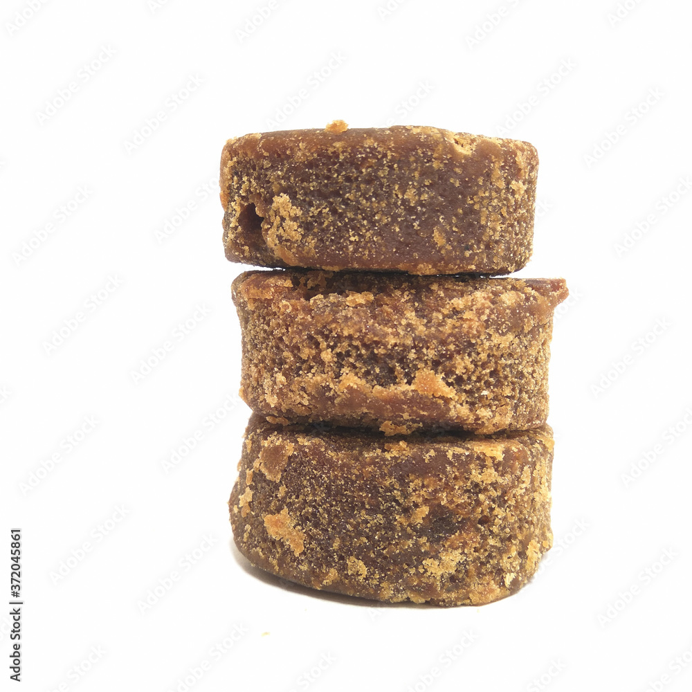 3 brown sugar (gula merah) isolated on white background 3 brown sugar (gula merah) isolated on white background