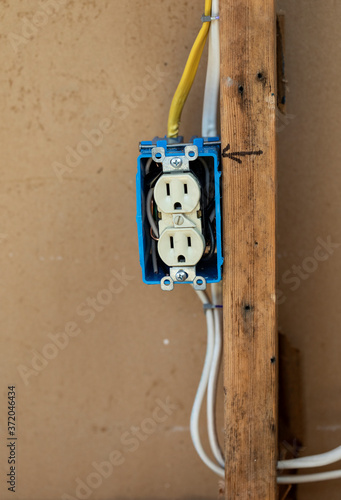 interior view of an electrical outlet being installed
