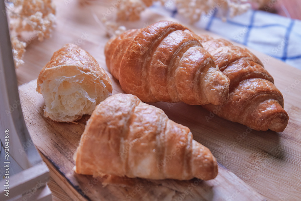 Croissants on the wooden board