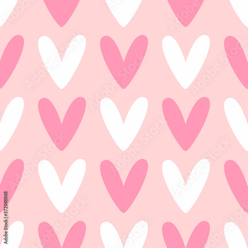 Seamless pattern with repeating hearts. Cute girly vector illustration.