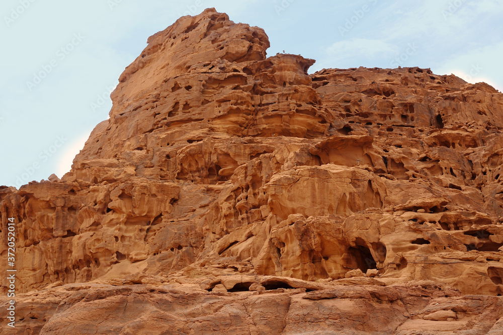 Wadi Rum.Reserve of the desert. Martian landscape. Fancy desert mountains against the sky. Wadi Rum.Reserve of the desert. Martian landscape. Fancy desert mountains against the sky.