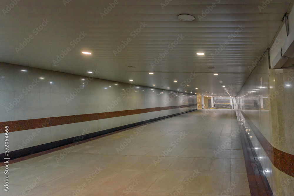 Empty underground passenger metro tunnel